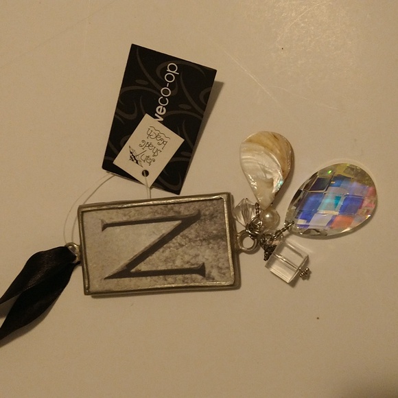 Hanging capital N crystal charm with a black satin tie - Picture 3 of 5